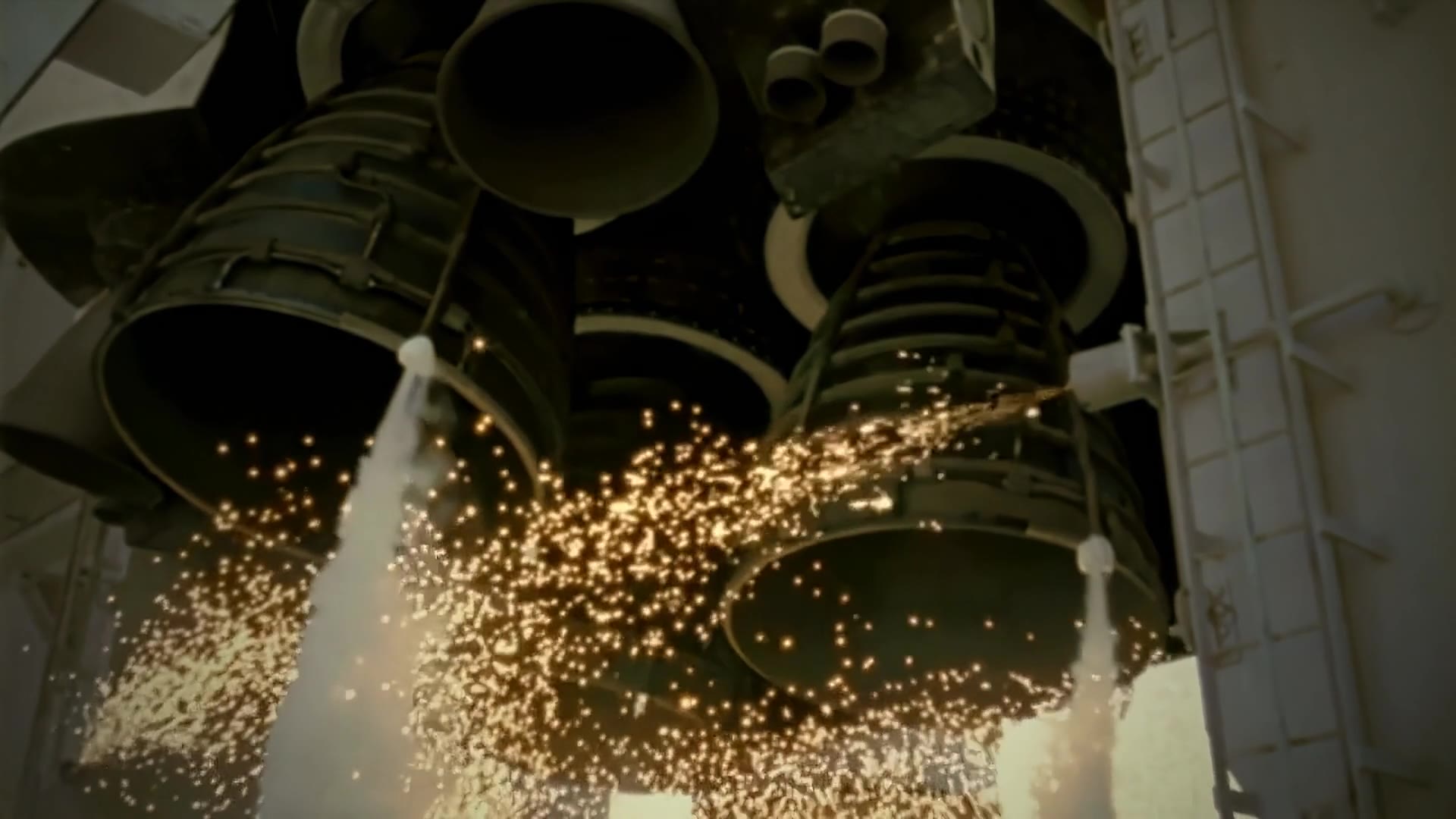 Space Shuttle main engines igniting